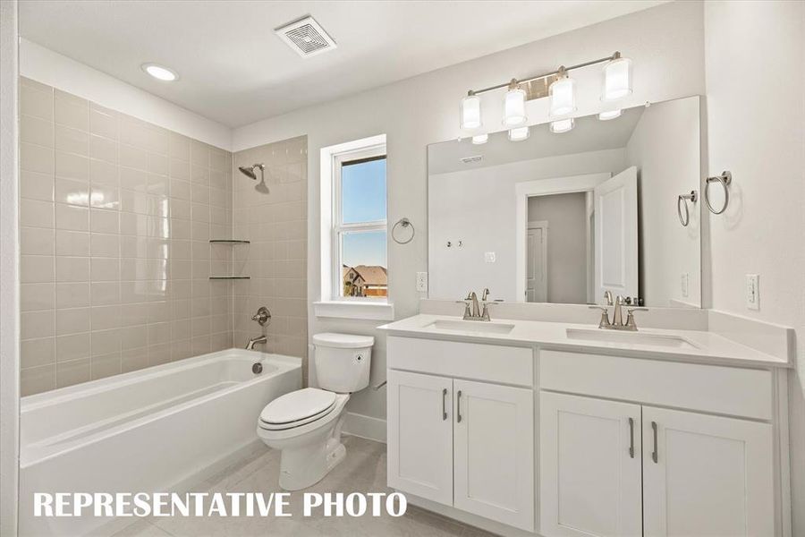 Guests will enjoy their own space in this lovely guest bath!  REPRESENTATIVE PHOTO