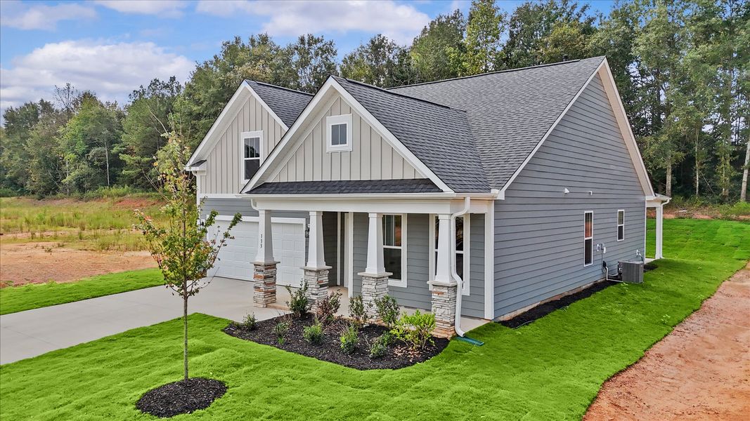 Exceptional home with tasteful exterior finishes and a thoughtfully designed façade