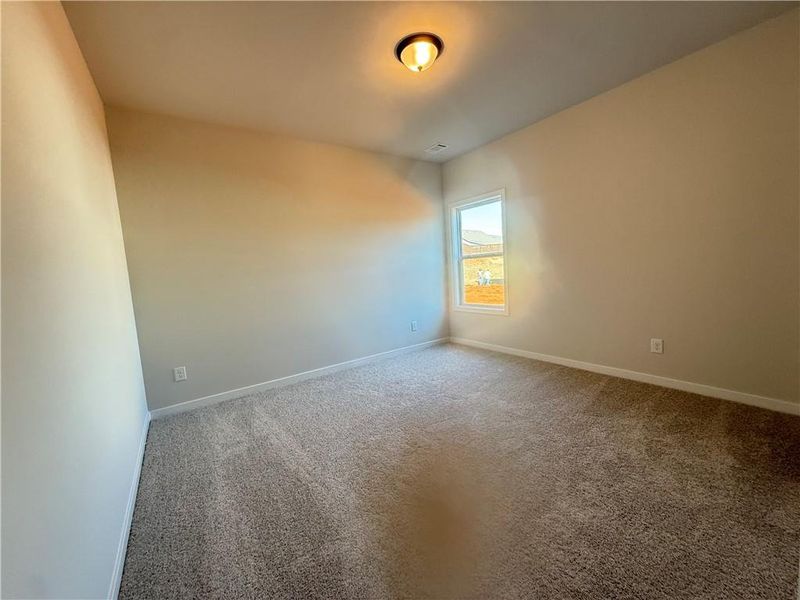 Spacious, unfurnished interior of a new home in Ponderosa Farms Reserve, Gainesville (Image 18).