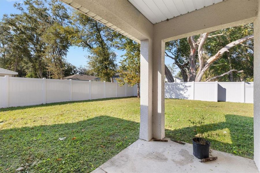 Exterior details and patio area of a home in , Summerfield (Image 22).