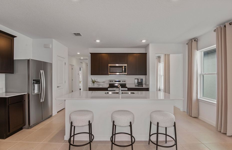 Furnished interior view inside a new home in Riversong, Parrish (Image 7).