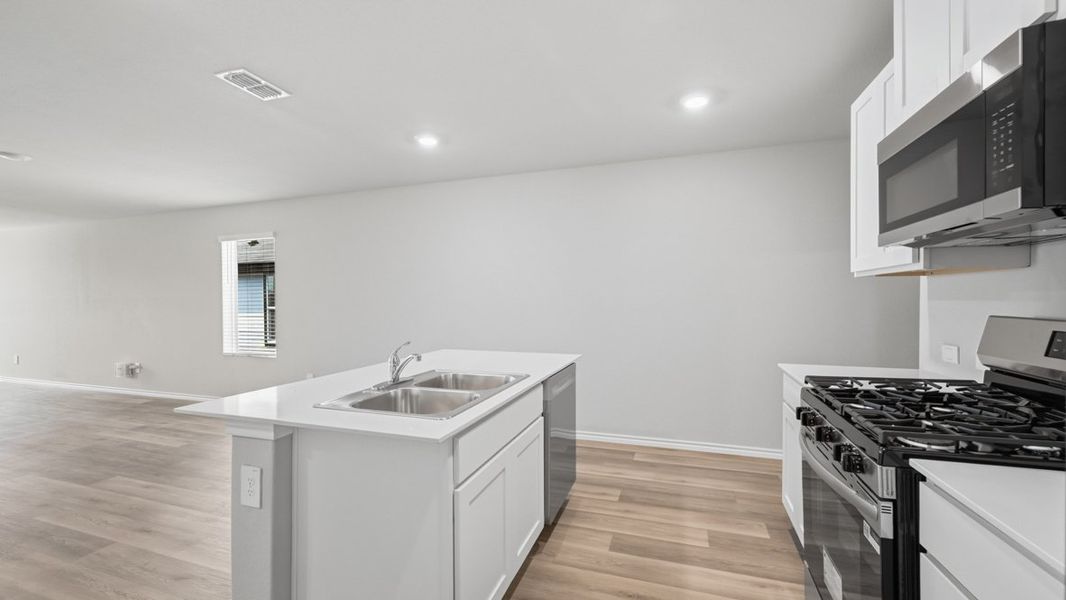 Representative furnished interior of a home built from the Caprock by D.R. Horton in Hickory Grove, Krum (Image 12).