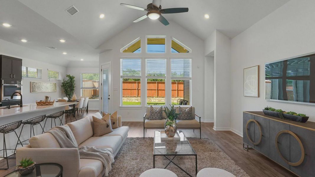 Representative furnished interior of a home built from the Brooks by Chesmar Homes in University Heights, Round Rock (Image 10).