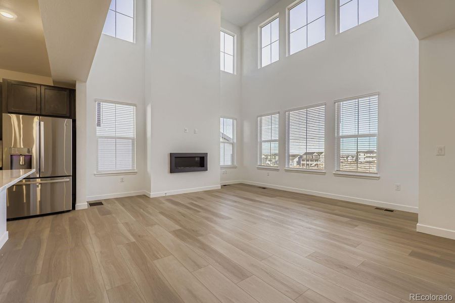 Spacious, unfurnished interior of a new home in Sunset Village: The Grand Collection, Erie (Image 10).