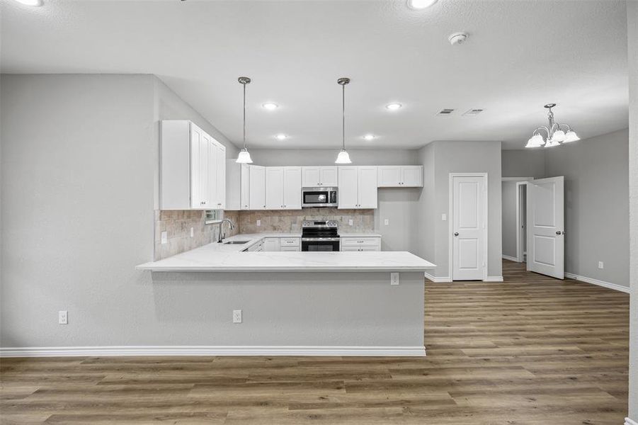 Furnished interior view inside a new home in , Whitney (Image 6).