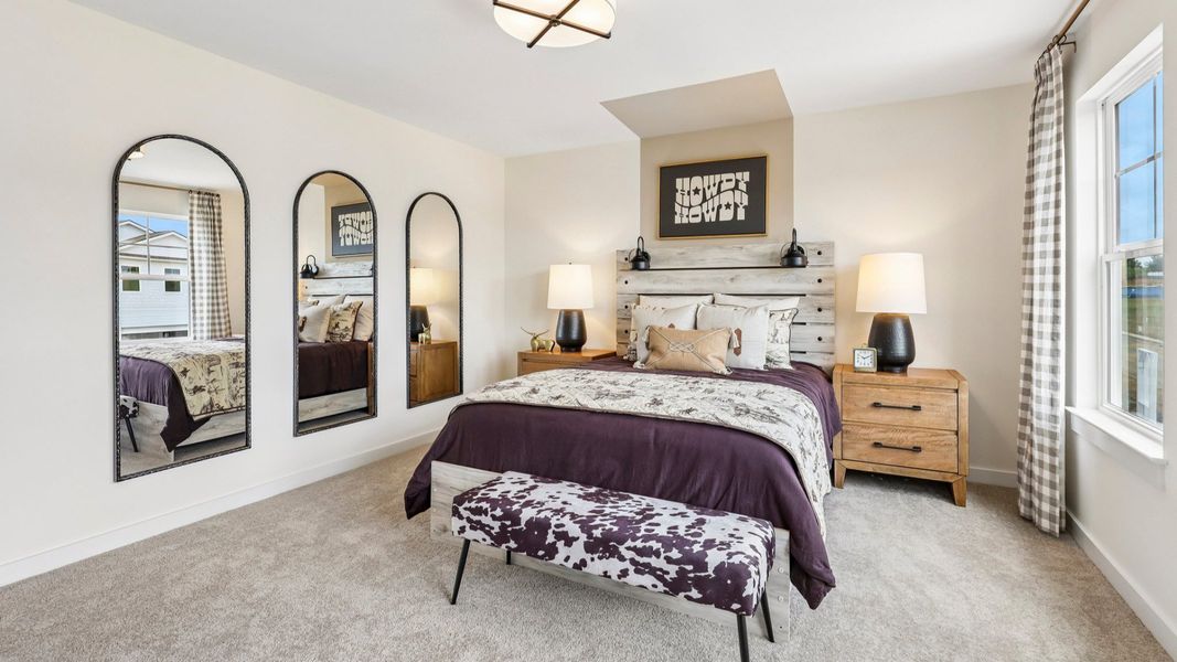 Secondary bedroom with carpet, closet, and window Secondary bedroom with carpet, closet, and window