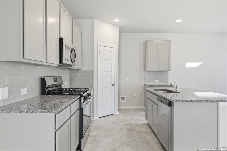 Furnished interior view inside a new home in Hunters Ranch, San Antonio (Image 8).