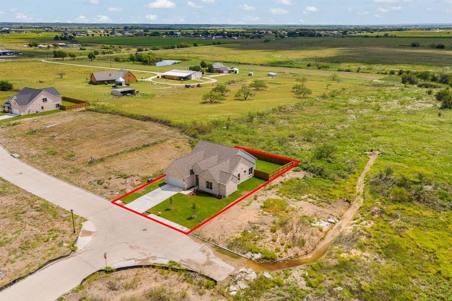 Front exterior of a new home in , Venus, TX, highlighting curb appeal (Image 28). Front exterior of a new home in , Venus, TX, highlighting curb appeal (Image 28).