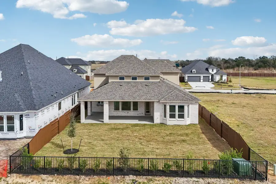 Exterior details and patio area of a home in Del Bello Lakes 60', Manvel (Image 26).