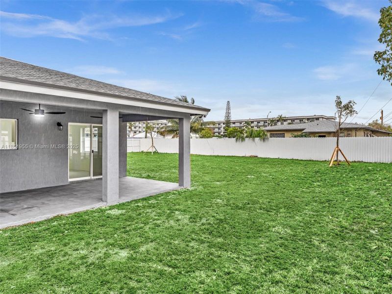 Front exterior of a new home in , North Miami, FL, highlighting curb appeal (Image 20). Front exterior of a new home in , North Miami, FL, highlighting curb appeal (Image 20).