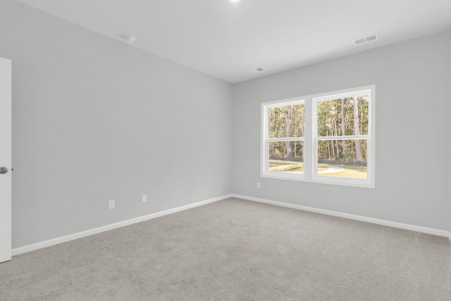 Spacious, unfurnished interior of a new home in Central Creek, Goose Creek (Image 23).