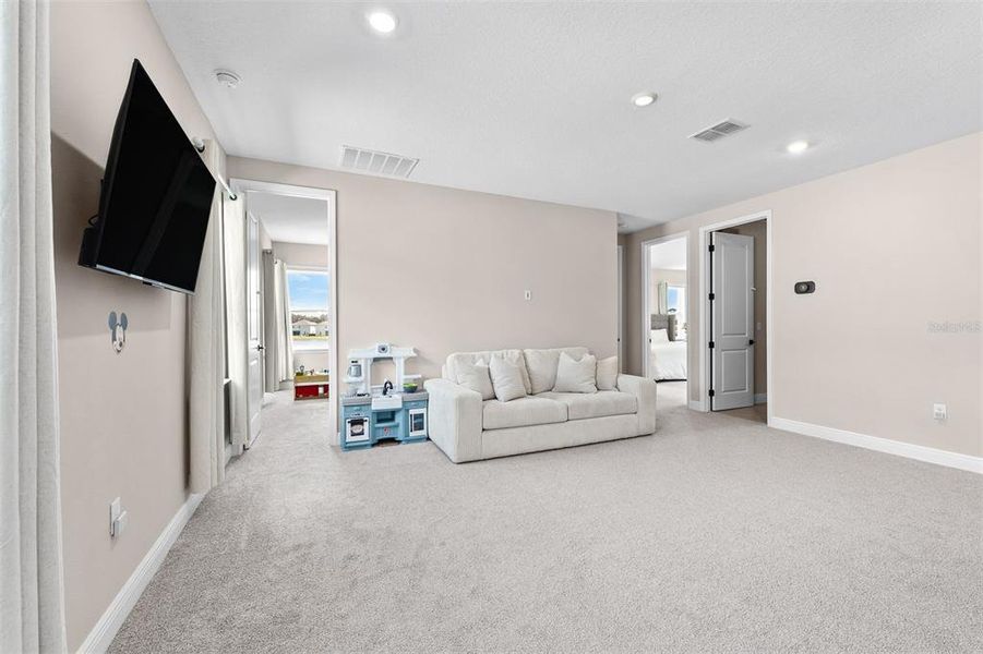 Furnished interior view inside a new home in Laureate Park, Orlando (Image 38).