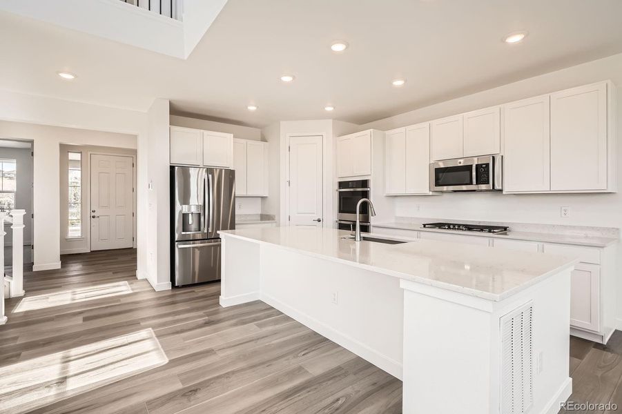 Furnished interior view inside a new home in Macanta: The Grand Collection, Castle Rock (Image 5).