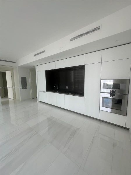 Furnished interior view inside a new home in Aston Martin Residences, Miami (Image 9).