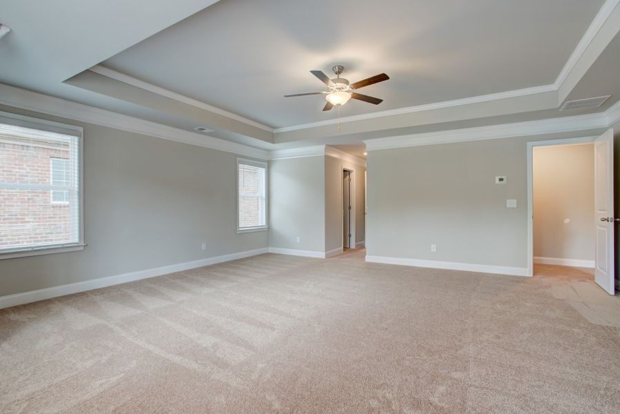 The massive master bedroom includes two walk-in closets and a luxurious master bathroom