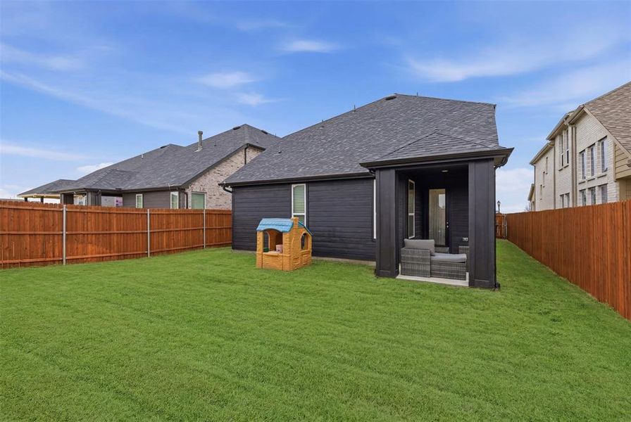 Exterior details and patio area of a home in Heartland, Heartland (Image 22).
