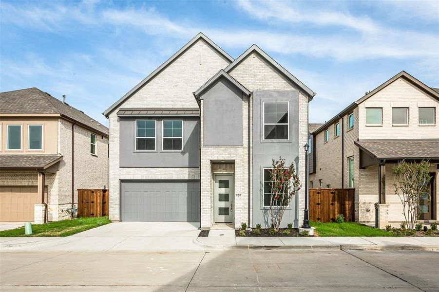 View of front of home with a garage