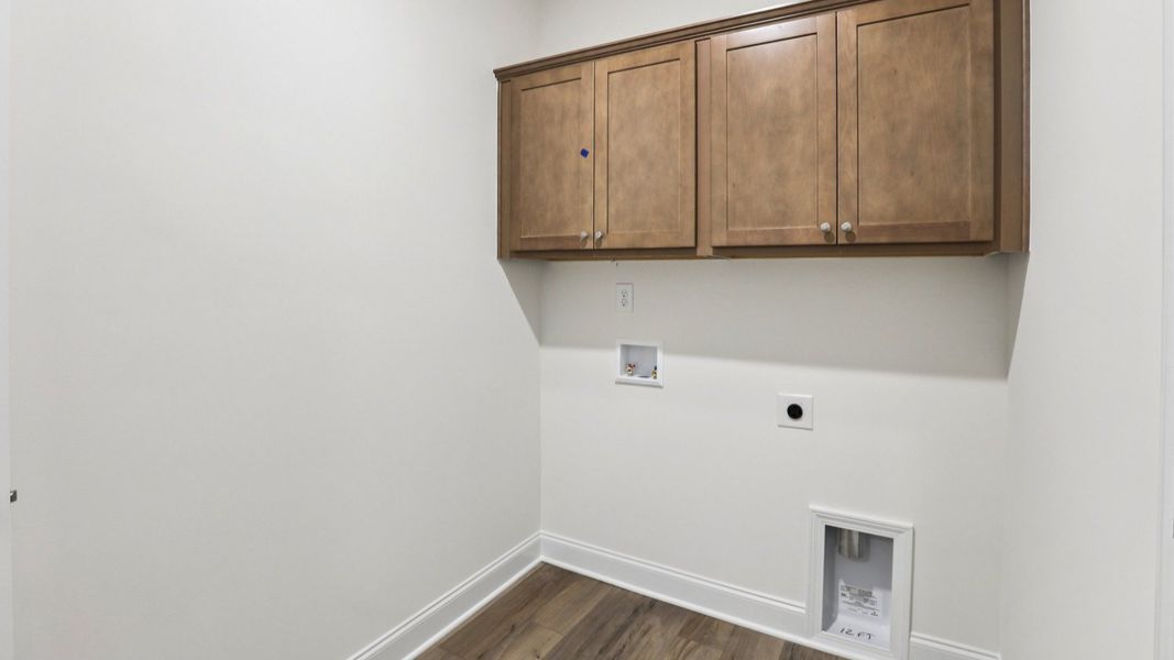 Pendleton home plan conveniently located laundry room with cabinetry Pendleton home plan conveniently located laundry room with cabinetry
