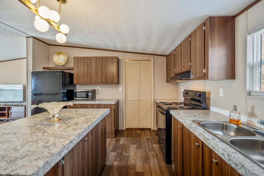 Furnished interior view inside a new home in , Conroe (Image 21).