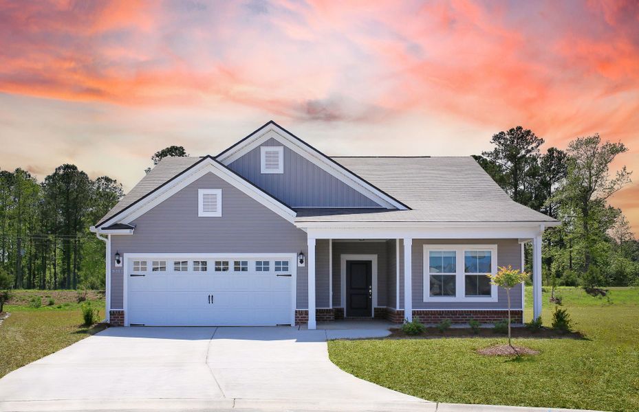 Bedrock New Home Exterior LC3G at Twilight with a covered porch Bedrock New Home Exterior LC3G at Twilight with a covered porch