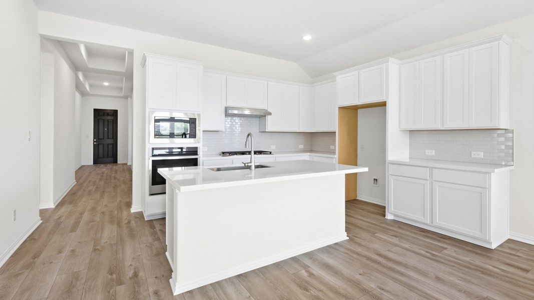 Furnished interior view inside a new home in Carillon, Manor (Image 12).
