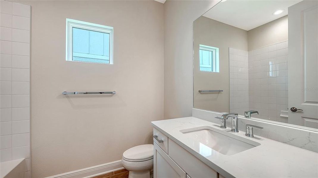 Furnished interior view inside a new home in Grand Park, Sarasota (Image 13).