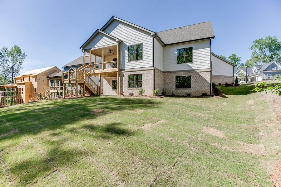 Front exterior of a new home in , Jefferson, GA, highlighting curb appeal (Image 24).