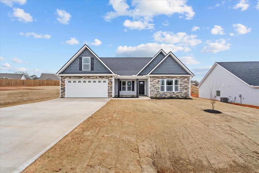 Representative exterior photo of a completed home built from the Arcadia by Enchanted Homes in Ballentine Ridge, Lyman, SC (Image 1).