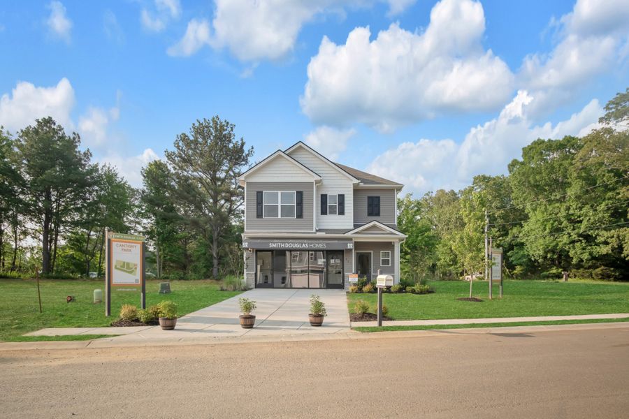 Front exterior of a new home in Cantigny Park, Clarksville, TN, highlighting curb appeal (Image 2). Front exterior of a new home in Cantigny Park, Clarksville, TN, highlighting curb appeal (Image 2).