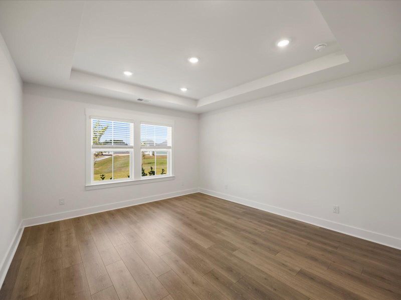 Spacious, unfurnished interior of a new home in The Coves at Lakes of Cane Bay, Summerville (Image 22). Spacious, unfurnished interior of a new home in The Coves at Lakes of Cane Bay, Summerville (Image 22).