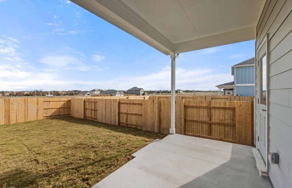 Exterior details and patio area of a home in Patterson Ranch, Georgetown (Image 22).