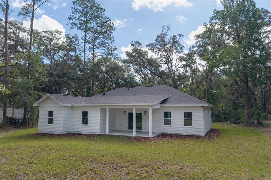 Exterior details and patio area of a home in , Micanopy (Image 4).