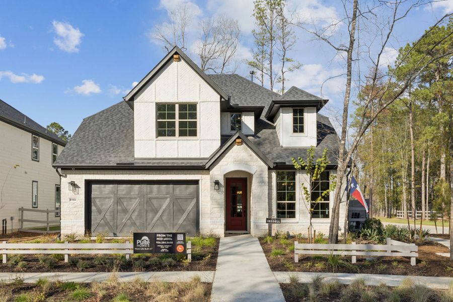 Representative exterior photo of a completed home built from the Iredell by Pulte Homes in Pulte Homes at Two Step Farm, Montgomery, TX (Image 22). Representative exterior photo of a completed home built from the Iredell by Pulte Homes in Pulte Homes at Two Step Farm, Montgomery, TX (Image 22).