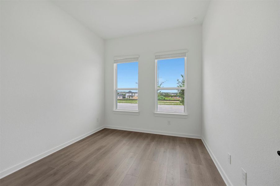 Spacious, unfurnished interior of a new home in Heritage, Dripping Springs (Image 7).
