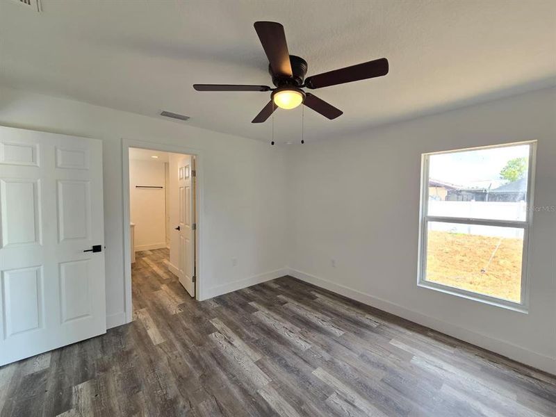 Spacious, unfurnished interior of a new home in , Port Charlotte (Image 27).