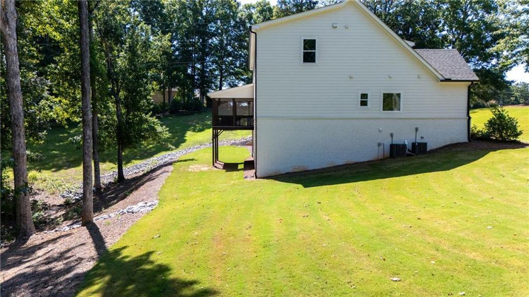 Exterior details and patio area of a home in , Hoschton (Image 47).