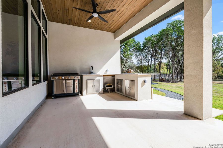 Exterior details and patio area of a home in , New Braunfels (Image 3).