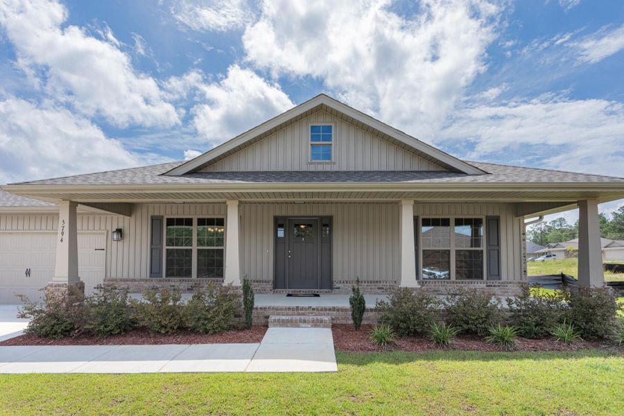 Representative exterior photo of a completed home built from the Plan 2685 by Adams Homes in Cedar Creek at Deerpoint Lake, Panama City, FL (Image 21).