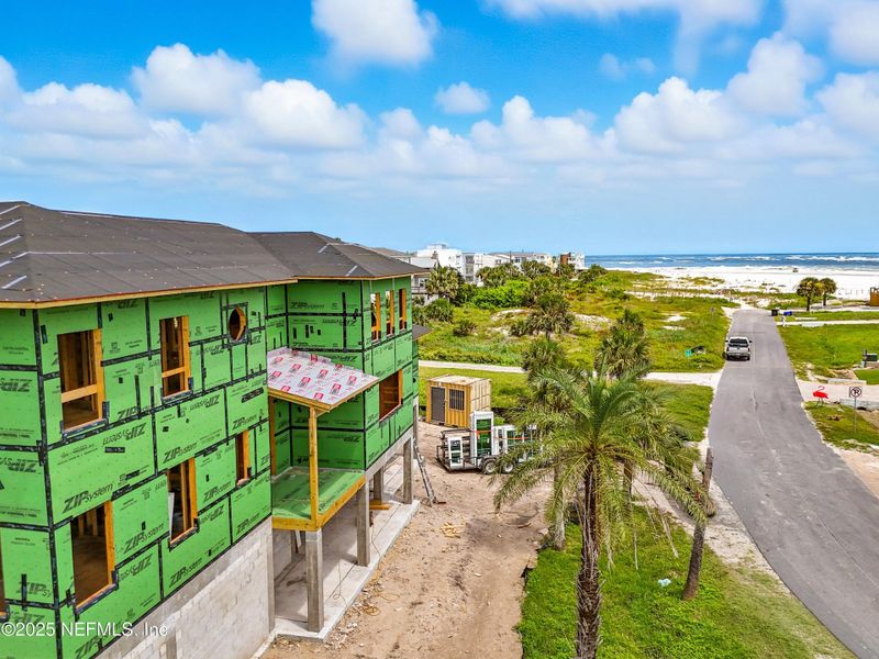 Front exterior of a new home in , St. Augustine, FL, highlighting curb appeal (Image 12).