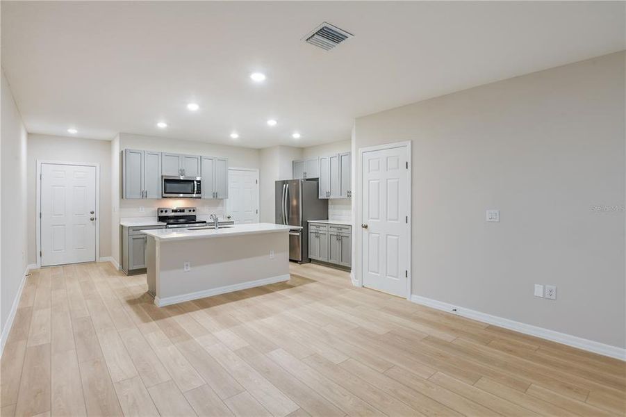 Furnished interior view inside a new home in Grove at Crosswind, Haines City (Image 8).