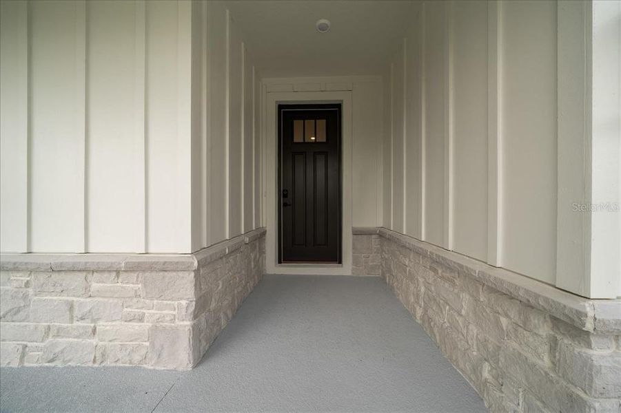 Exterior details and patio area of a home in , Spring Hill (Image 3).