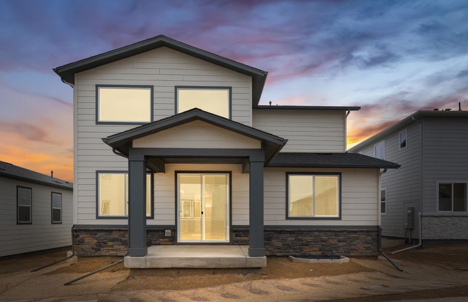 Front exterior of a new home in Harvest Crossing, Aurora, CO, highlighting curb appeal (Image 19).