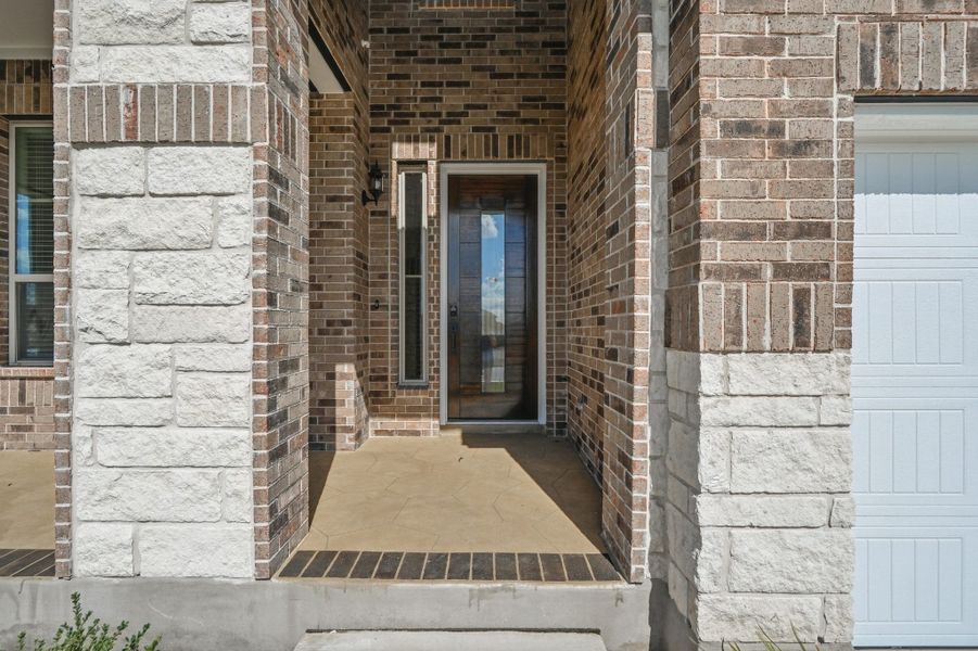 Exterior details and patio area of a home in Alsatian Oaks, Castroville (Image 3).