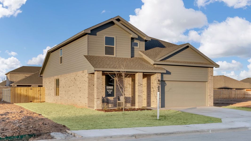 Front exterior of a new home in Viridian, Lubbock, TX, highlighting curb appeal (Image 2).