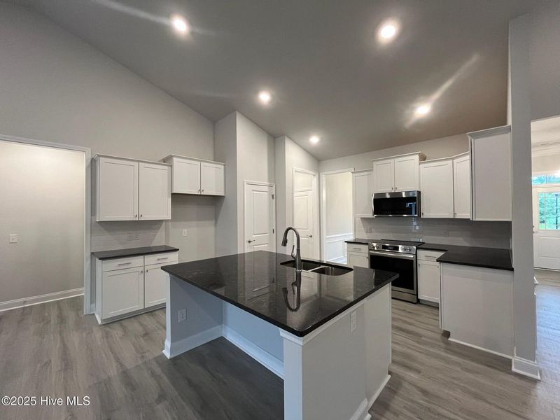 Furnished interior view inside a new home in Palmetto Creek, Bolivia (Image 3).
