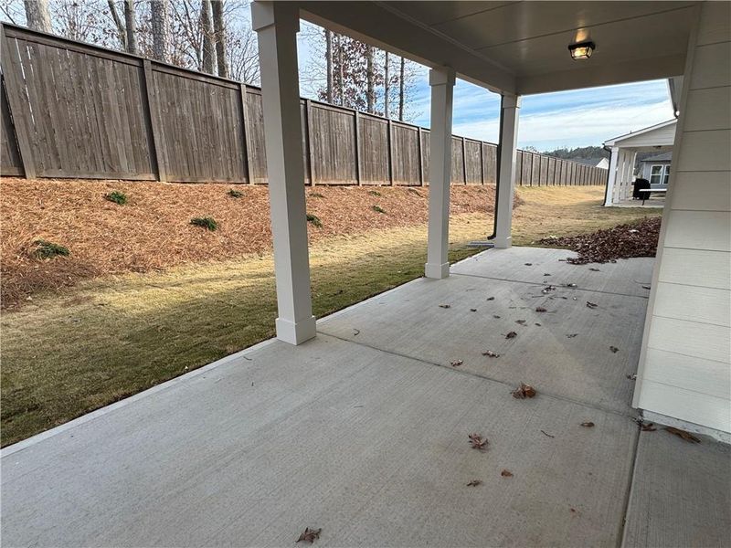 Exterior details and patio area of a home in Rosewood Lake Preserve, Hoschton (Image 14).
