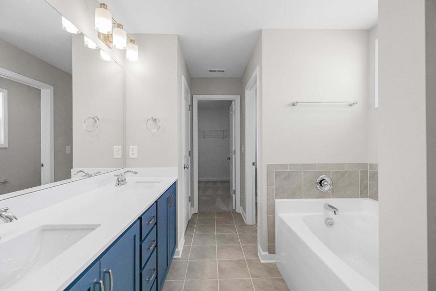 Representative furnished interior of a home built from the Aberdeen by Caviness & Cates Communities in Bartlett Manor, Youngsville (Image 187).