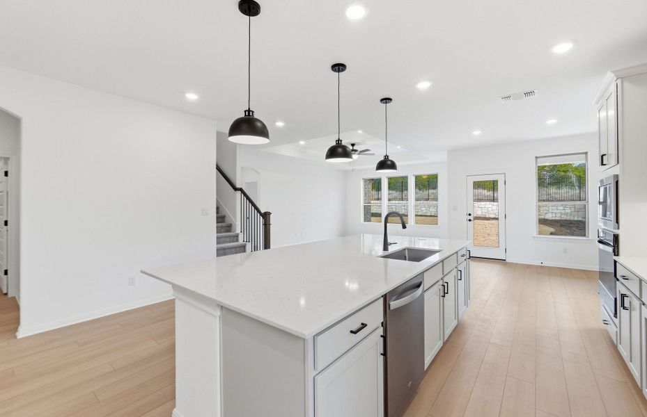 Furnished interior view inside a new home in West Cypress Hills, Spicewood (Image 16).