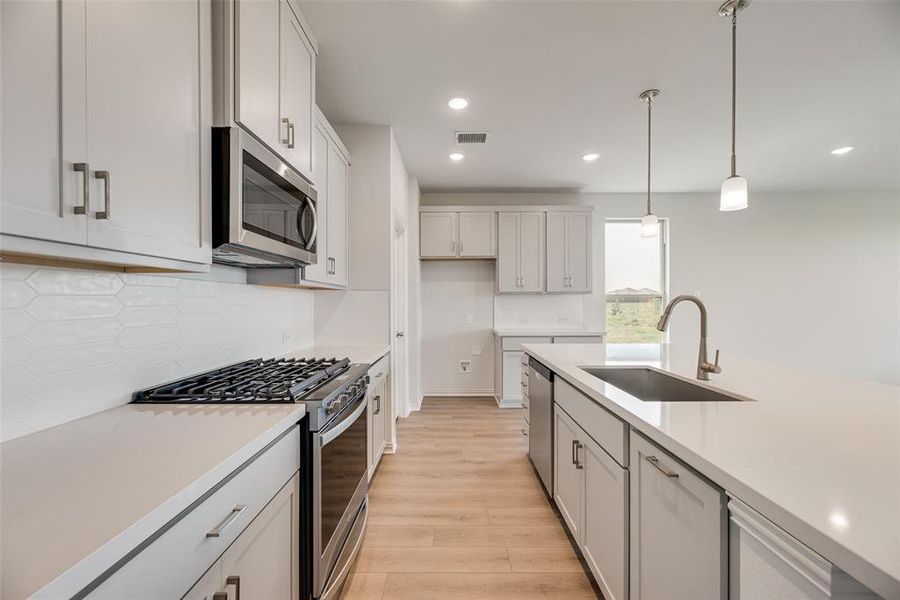 Furnished interior view inside a new home in Spiritas Ranch, Little Elm (Image 6). Furnished interior view inside a new home in Spiritas Ranch, Little Elm (Image 6).