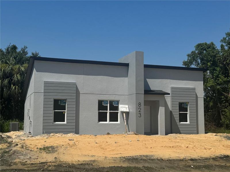 Front exterior of a new home in , Winter Garden, FL, highlighting curb appeal (Image 16).